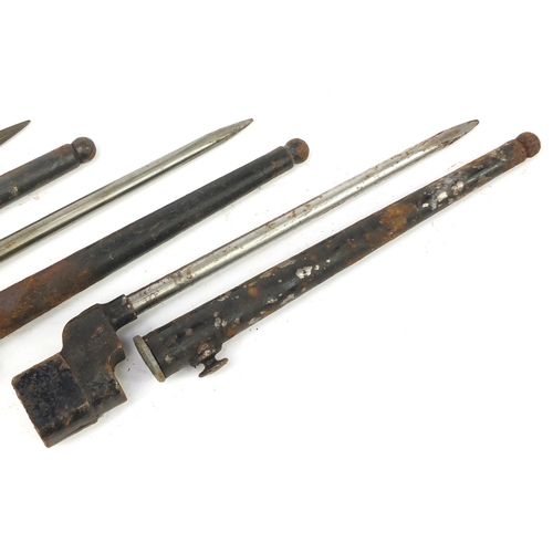 3781 - Three British military socket bayonets with scabbards, each 27.5cm in length