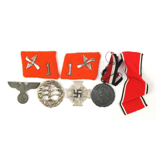 3412 - German militaria including a Faithful Service cross and Civil Defence medal