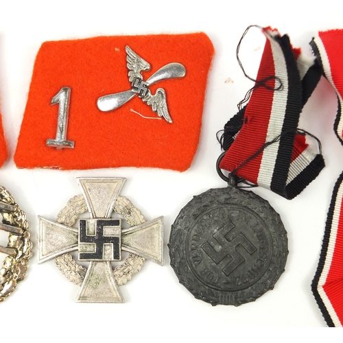 3412 - German militaria including a Faithful Service cross and Civil Defence medal