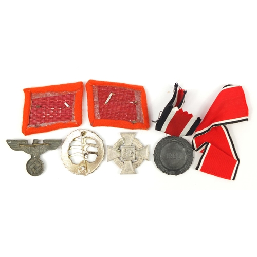 3412 - German militaria including a Faithful Service cross and Civil Defence medal