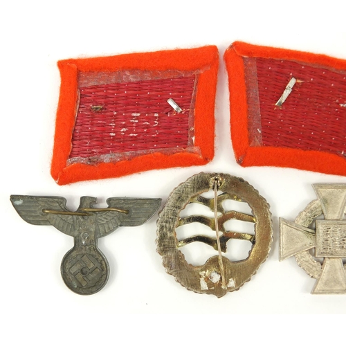 3412 - German militaria including a Faithful Service cross and Civil Defence medal