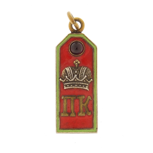 3321 - Russian silver gilt and enamel pendant, set with a cabochon garnet, 5cm in length, 11.0g