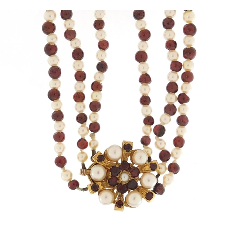 4016 - Three row garnet and pearl necklace with 9ct gold clasp, DHJ maker's mark, housed in a JB Yabsley bo... 