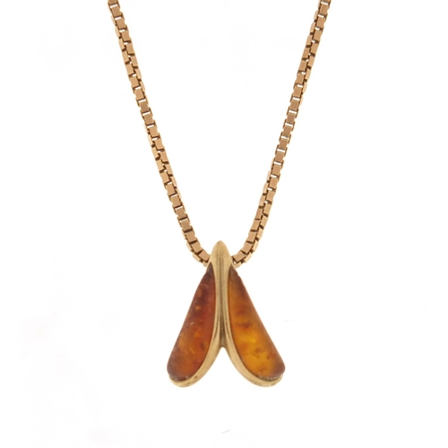 3930 - 9ct gold amber pendent, 2cm in length, 2.2g on a 9ct gold necklace, 48cm in length, 7.0g