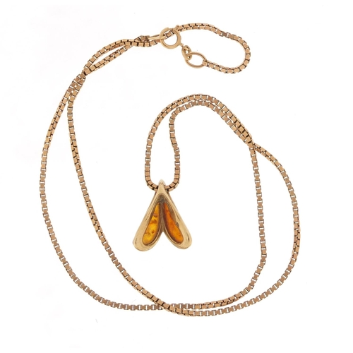 3930 - 9ct gold amber pendent, 2cm in length, 2.2g on a 9ct gold necklace, 48cm in length, 7.0g