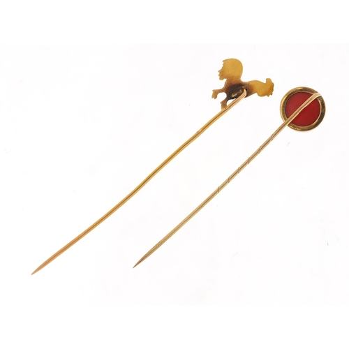 3763 - Two Victorian unmarked gold tie pins including a cockerel and one set with a cabochon carnelian, the... 