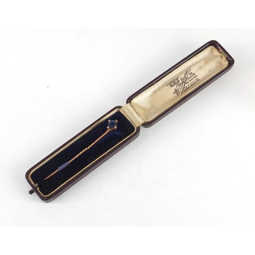 3319 - Art Deco unmarked gold sapphire and diamond tie pin, 6.5cm in length, 1.5g, housed in a tooled leath... 