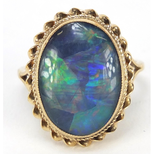 4125 - Unmarked gold cabochon opal ring, size O, 4.2g