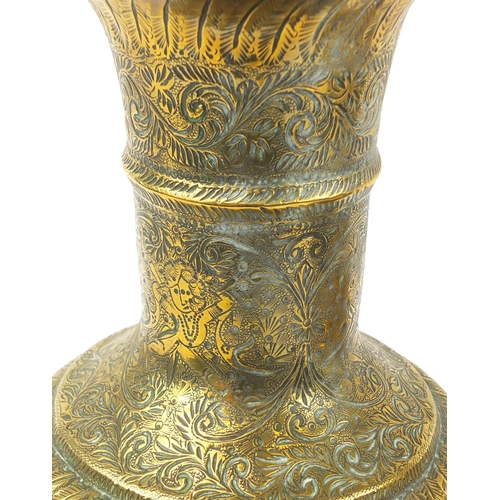 3847 - Large pair of Indian brass vases engraved with figures, animals and flowers, each 53cm high