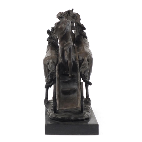 3514 - Large patinated bronze group of a figure in a horse drawn chariot, 37cm H x 61cm W x 20cm