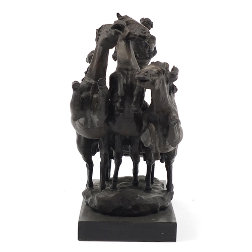 3514 - Large patinated bronze group of a figure in a horse drawn chariot, 37cm H x 61cm W x 20cm