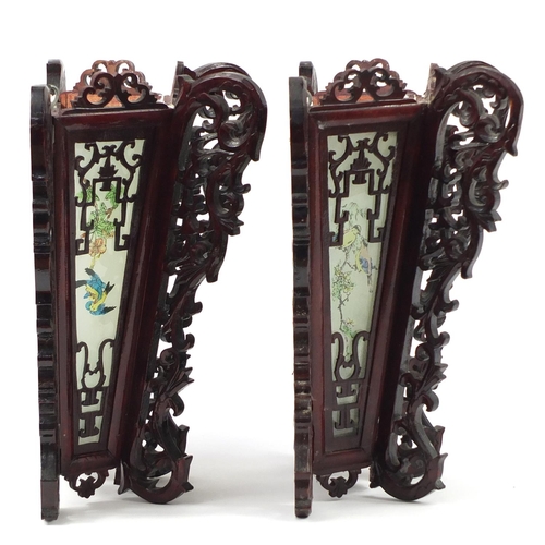 3947 - Pair of Chinese carved wood wall lights with panels, each decorated with birds, 33cm high