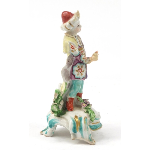 3370 - 18th century Derby Ottoman porcelain figure of a Turkish boy, 14.5cm high