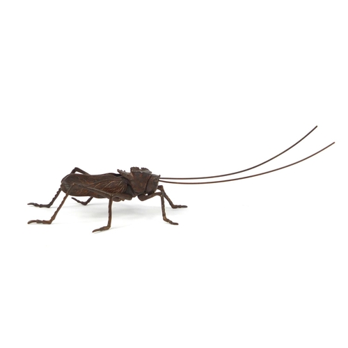 3798 - Japanese patinated bronze cricket with articulated antennae and legs, 14.5cm in length