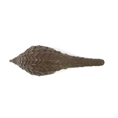 3799 - Japanese patinated bronze armadillo, impressed character marks to the base, 10.5cm in length