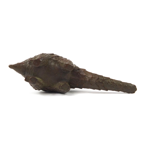 3799 - Japanese patinated bronze armadillo, impressed character marks to the base, 10.5cm in length