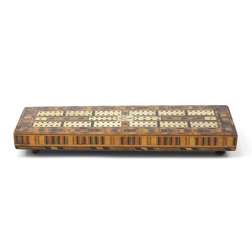 3894 - Masonic interest inlaid wood cribbage board with cork and ivory markers, 29.5cm x 10.5cm