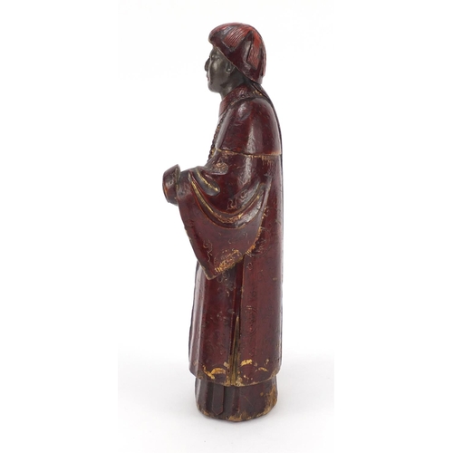 3562 - Antique Chinese red lacquered wood carving of a man wearing a robe, 24cm high