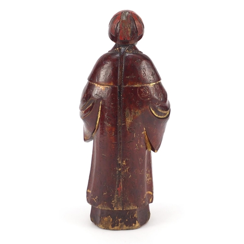 3562 - Antique Chinese red lacquered wood carving of a man wearing a robe, 24cm high