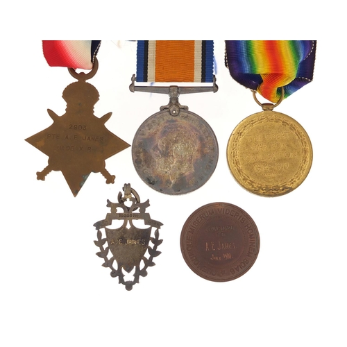 3405 - British military World War I trio with Royal Life Saving Society medallion and silver jewel, the tri... 