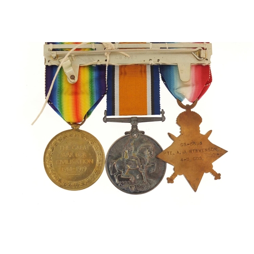 3108 - British Military World War I medal group comprising a trio awarded to GS-6693PTE.A.J.STEVENSON.4-D.G... 