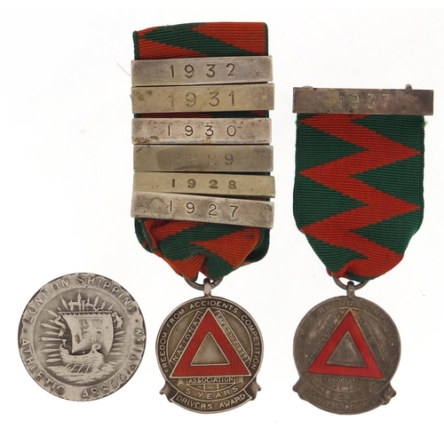 3247 - Two silver and enamel National Safety First Association jewels and a silver London Athletic Shipping... 