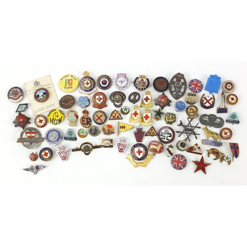 3706 - Vintage badges and lapels, some military interest including American World War II sterling silver Pa... 