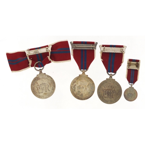 3317 - Three Elizabeth II 1953 coronation medals and a miniature with boxes including a ladies issue