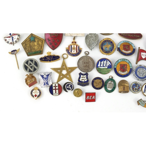 3708 - Vintage and later badges and lapels including South African Mining Brooch, BEA, The Society of Susse... 