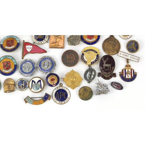 3708 - Vintage and later badges and lapels including South African Mining Brooch, BEA, The Society of Susse... 