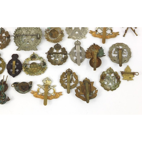 3118 - British military World War I cap badges including Australian Commonwealth Military Forces, Royal Air... 