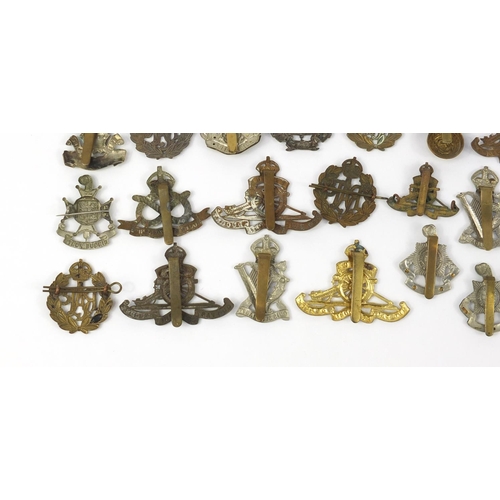 3197 - British military World War I cap badges including Essex Regiment, Royal Air Force, Hampshire, The Ro... 