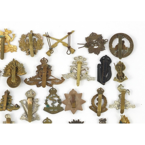 3197 - British military World War I cap badges including Essex Regiment, Royal Air Force, Hampshire, The Ro... 