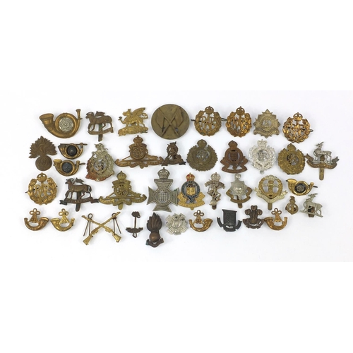 3288 - British military World War I cap badges including Royal Air Force, The Buffs, The Royal Engineers, T... 