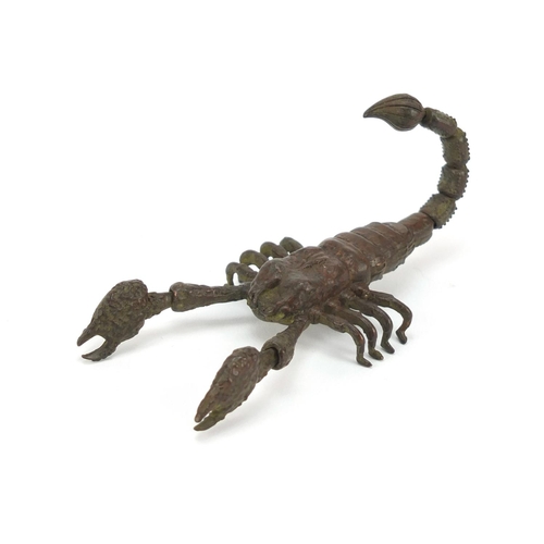 3574 - Japanese patinated bronze scorpian with articulated tail and pincers, 9cm in length