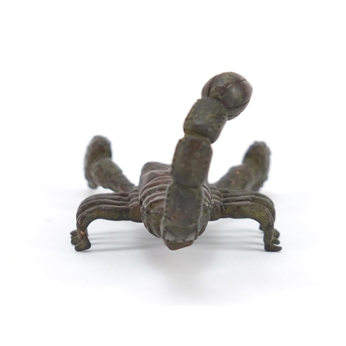 3574 - Japanese patinated bronze scorpian with articulated tail and pincers, 9cm in length