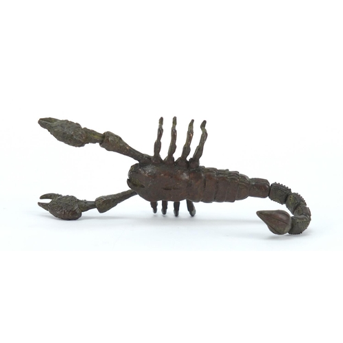 3574 - Japanese patinated bronze scorpian with articulated tail and pincers, 9cm in length