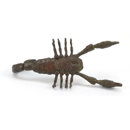 3574 - Japanese patinated bronze scorpian with articulated tail and pincers, 9cm in length