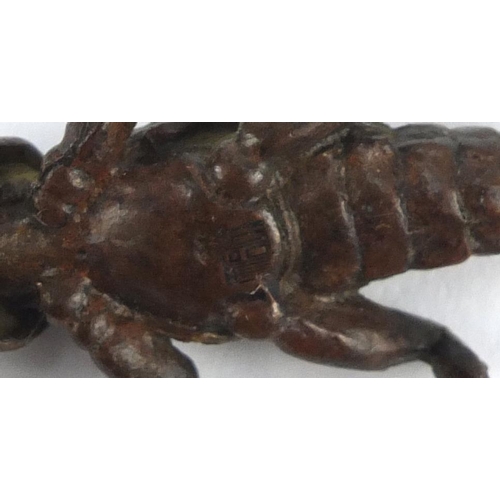 3576 - Japanese patinated bronze insect, impressed marks to the base, 6.5cm in length