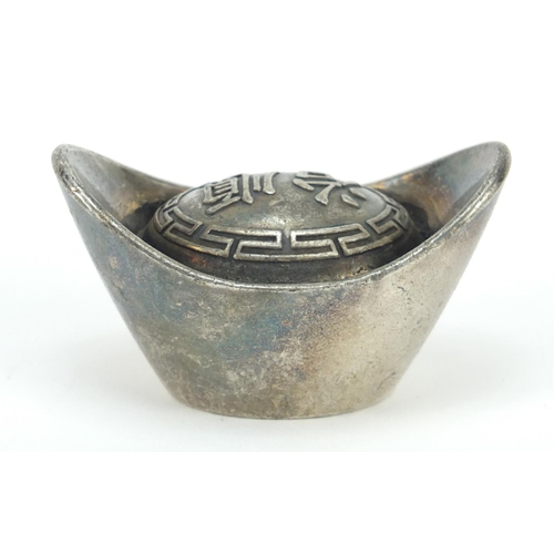 3569 - Chinese silver coloured metal scroll weight, impressed character marks, 6.5cm in diameter