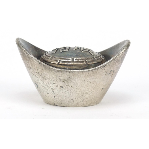 3569 - Chinese silver coloured metal scroll weight, impressed character marks, 6.5cm in diameter