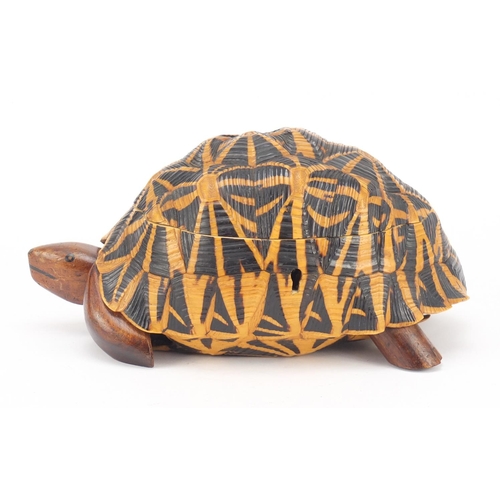 3831 - Anglo-Indian star tortoise tea caddy with ebony, fruitwood and exotic inlay, 24.5cm in length