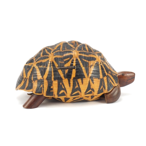 3831 - Anglo-Indian star tortoise tea caddy with ebony, fruitwood and exotic inlay, 24.5cm in length