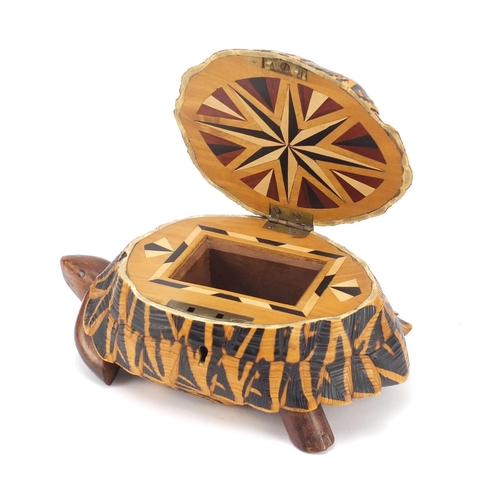 3831 - Anglo-Indian star tortoise tea caddy with ebony, fruitwood and exotic inlay, 24.5cm in length