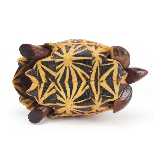 3831 - Anglo-Indian star tortoise tea caddy with ebony, fruitwood and exotic inlay, 24.5cm in length