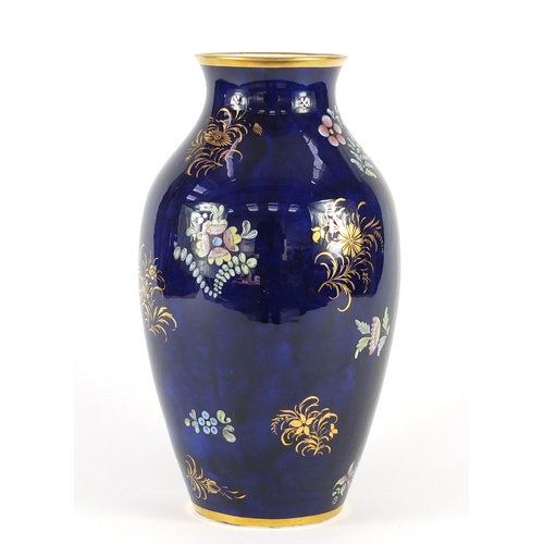 3908 - 19th century Spode porcelain ovoid vase, hand painted and gilded with floral sprays onto a blue grou... 