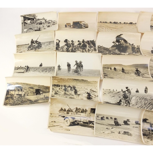 3198 - Twenty two German military black and white photographs, one signed Luce, including tanks and motorcy... 