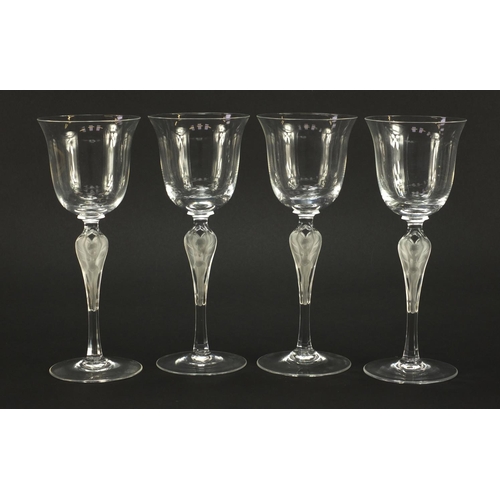 3972 - Set of four Faberge glasses with frosted glass figural stems, each 20.5cm high