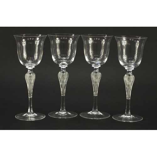 3972 - Set of four Faberge glasses with frosted glass figural stems, each 20.5cm high