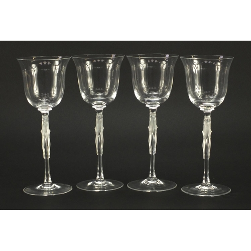 3972 - Set of four Faberge glasses with frosted glass figural stems, each 20.5cm high